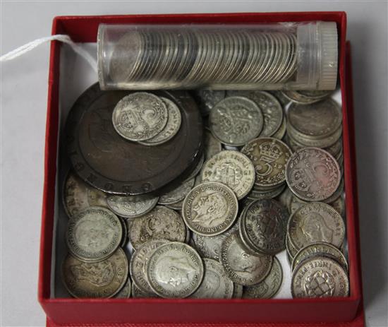 Assorted coins including silver 3d and other coins.